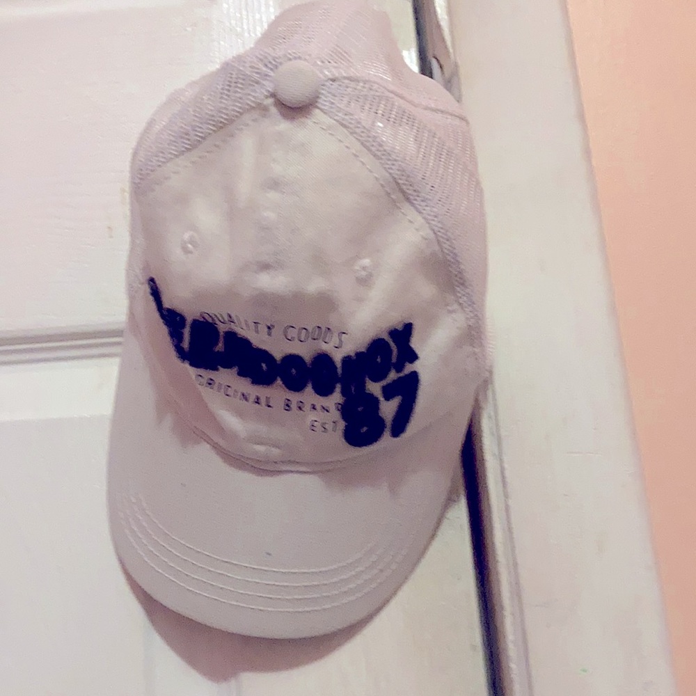 White blue and black hat